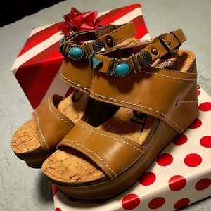 NWT Otto platforms with turquoise accents!